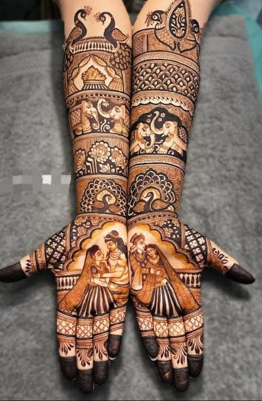 Dulha-dulhan palms with peacock and elephant bands